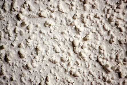 Textured popcorn ceiling risks